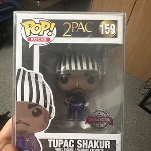 Funko Pop Rocks Figure with Black and White Hat